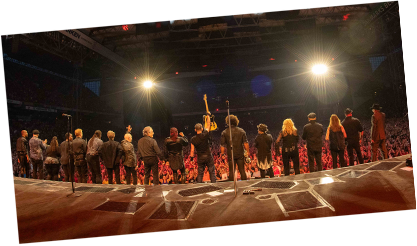 The E Street Band takes a bow on stage during 2023 Tour